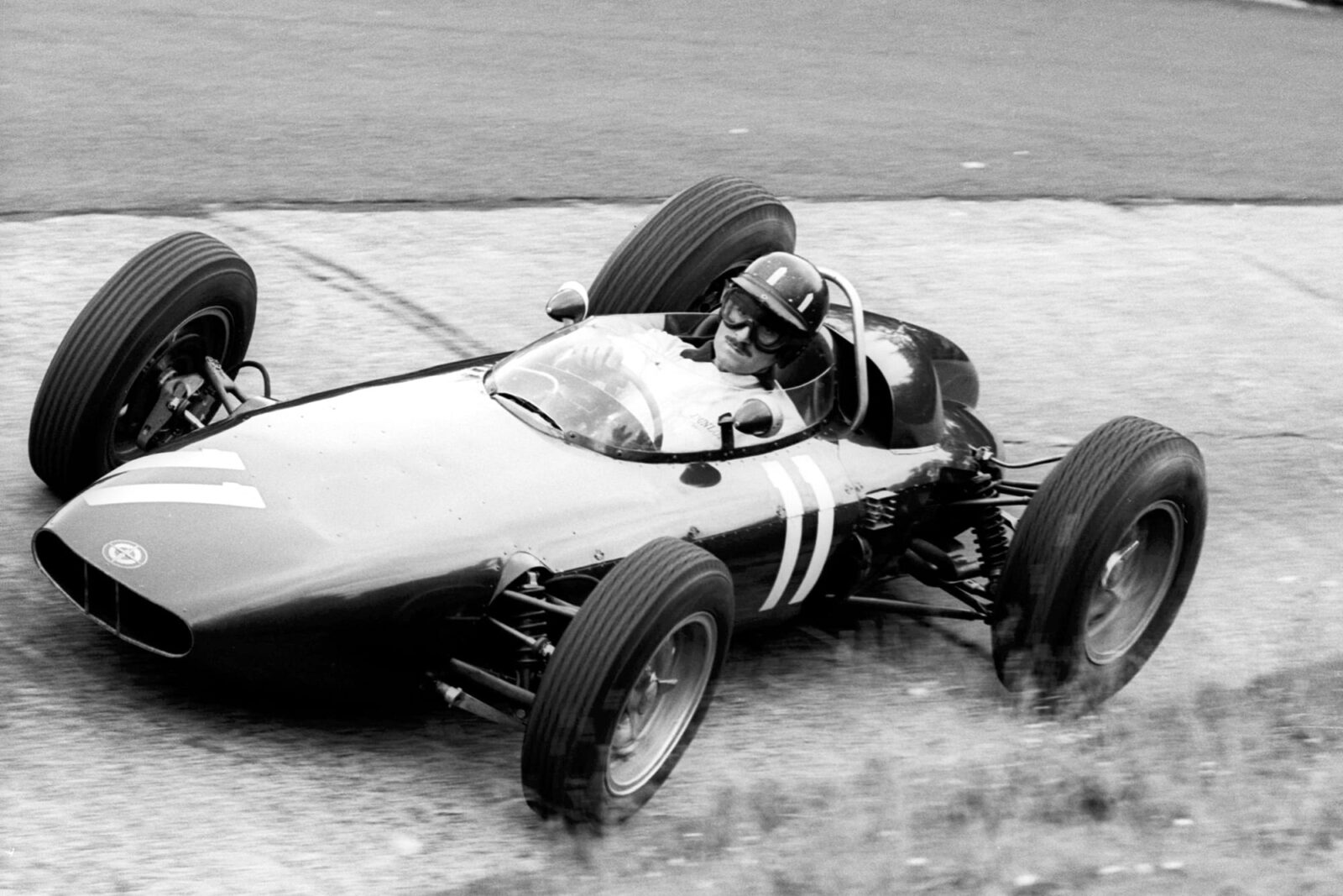 Hill put in a masterful performance in his BRM to win