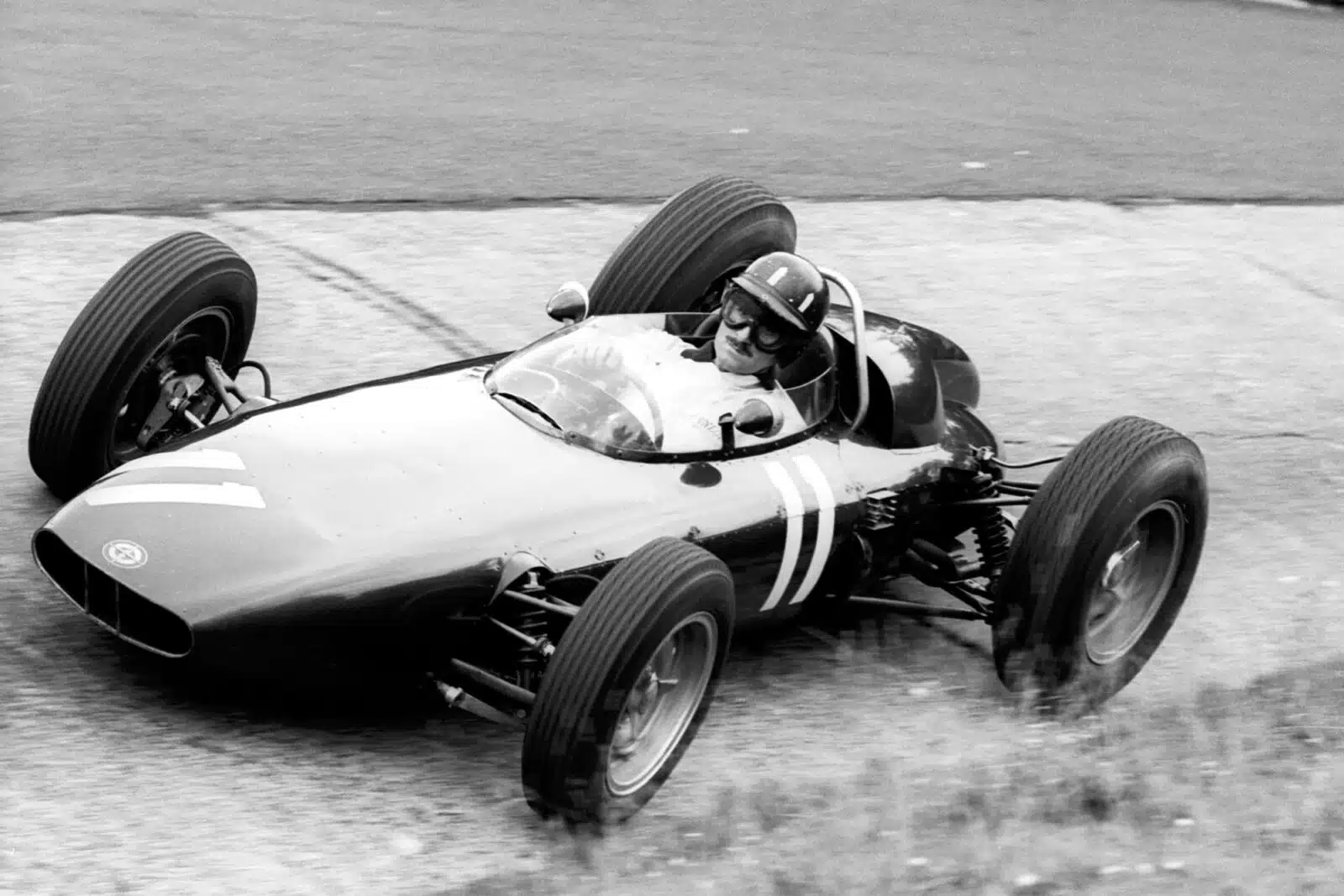 Hill put in a masterful performance in his BRM to win