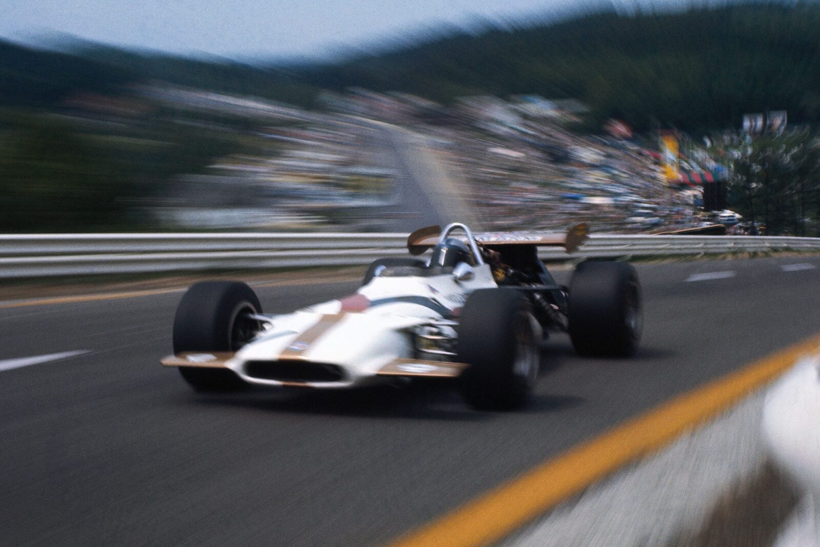 BRM's Pedro Rodriguez climbs through Raidillon.