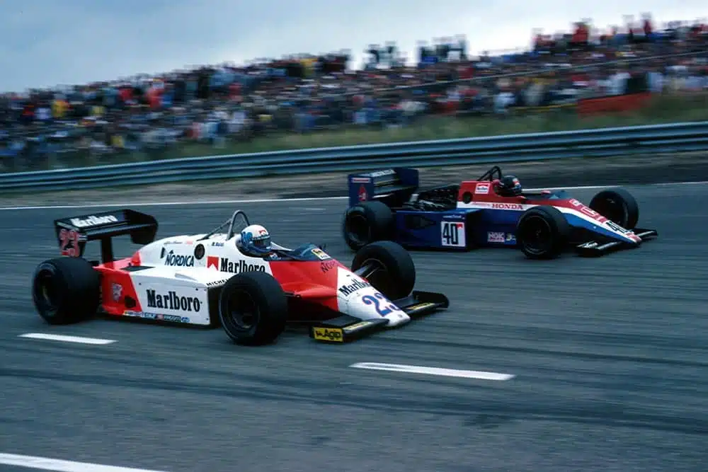 Mauro Baldi (Alfa Romeo 183T) attempts to pass on the inside of Stefan Johansson (Spirit Honda 201C).