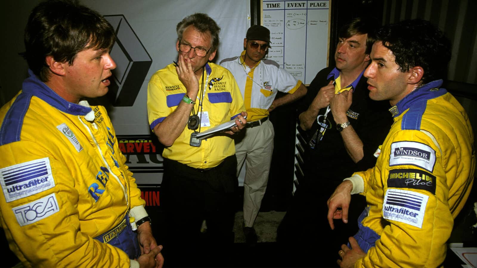 A Renault Team debrief (L to R)- Tim Harvey (GBR); team manager Keith Greene (GBR); Alain Menu (SUI). British Touring Car Championship, Oulton Park, England, 30 May 1994. (Photo by Sutton Images)