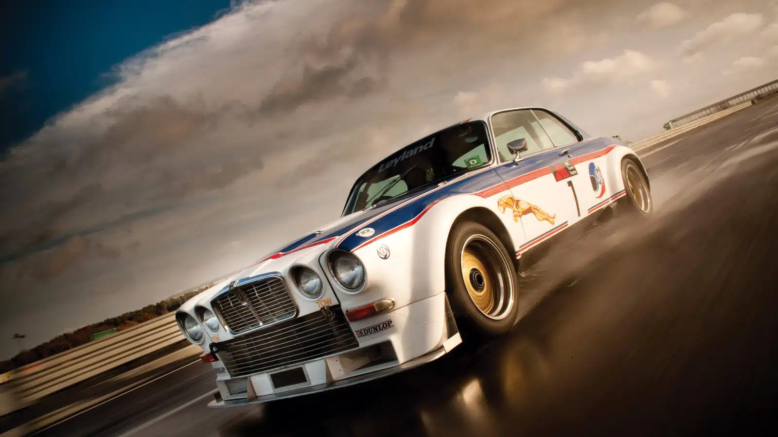 Broadspeed Jaguar XJC splashes through water at Silverstone