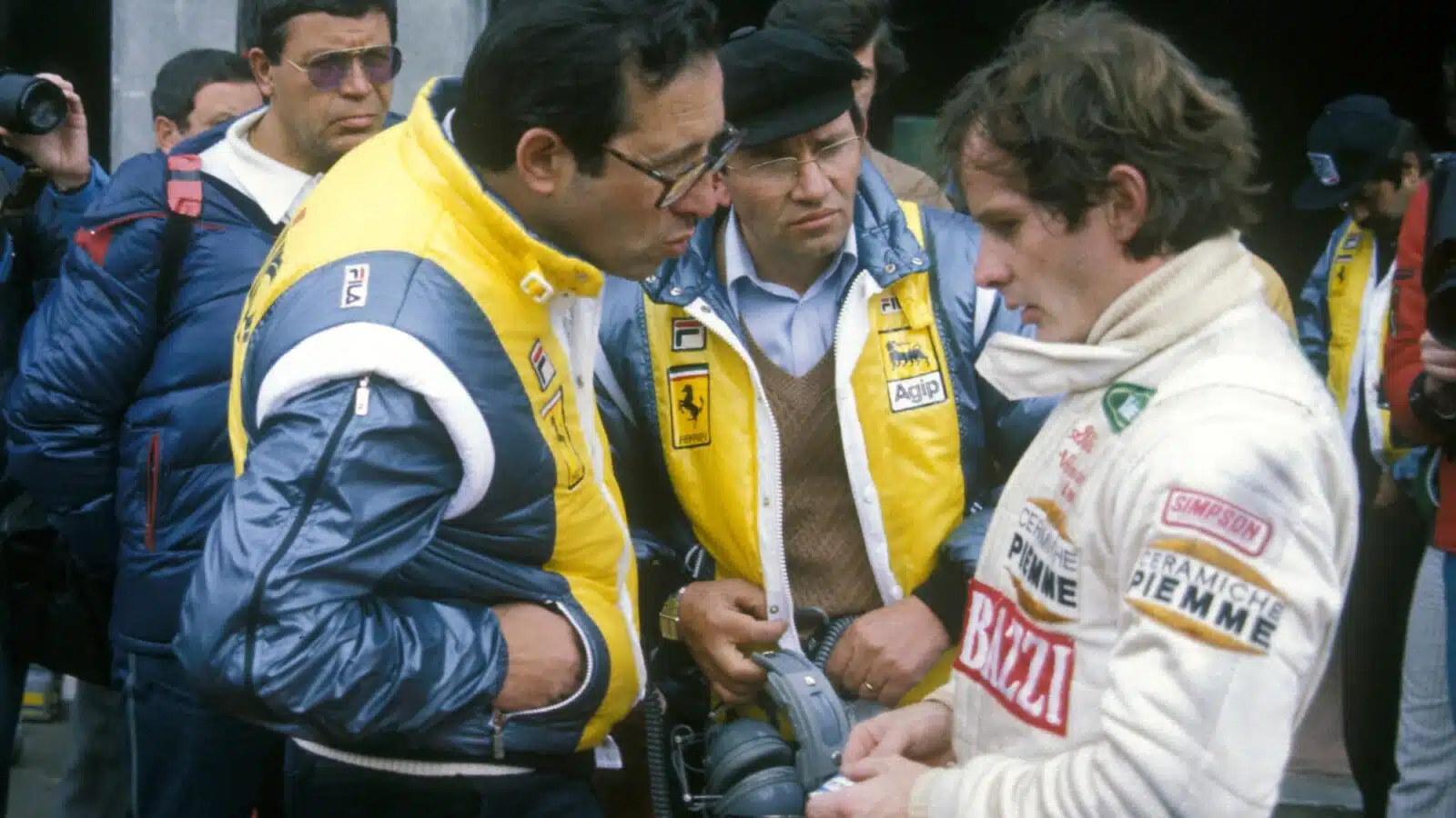 Mauro Forghieri speaks to Gilles Villeneuve ahead of practice at Zolder for the 1982 Dutch Grand Prix
