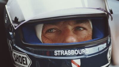 Portrait-of-Bob-Wollek-of-France,-driver-of-the-#8-Joest-Racing-Porsche-962C-during-the-FIA-World-Sportscar-Prototype-Championship-Empire-Trophy-on-19th-May-1990-at-the-Silverstone-Circuit-in-Silverstone,-United-Kingdom