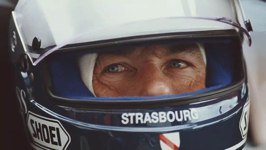 Portrait-of-Bob-Wollek-of-France,-driver-of-the-#8-Joest-Racing-Porsche-962C-during-the-FIA-World-Sportscar-Prototype-Championship-Empire-Trophy-on-19th-May-1990-at-the-Silverstone-Circuit-in-Silverstone,-United-Kingdom