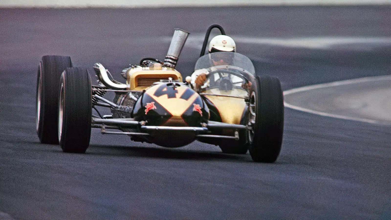Smokey Yunick side engined IndyCar at 1964 Indy 500 practice
