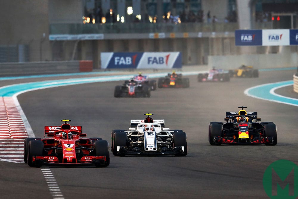 Kimi Räikkönen Ferrari, Charles Leclerc Sauber and Daniel Ricciardo Red Bull battle at the 2018 Abu Dhabi GP
