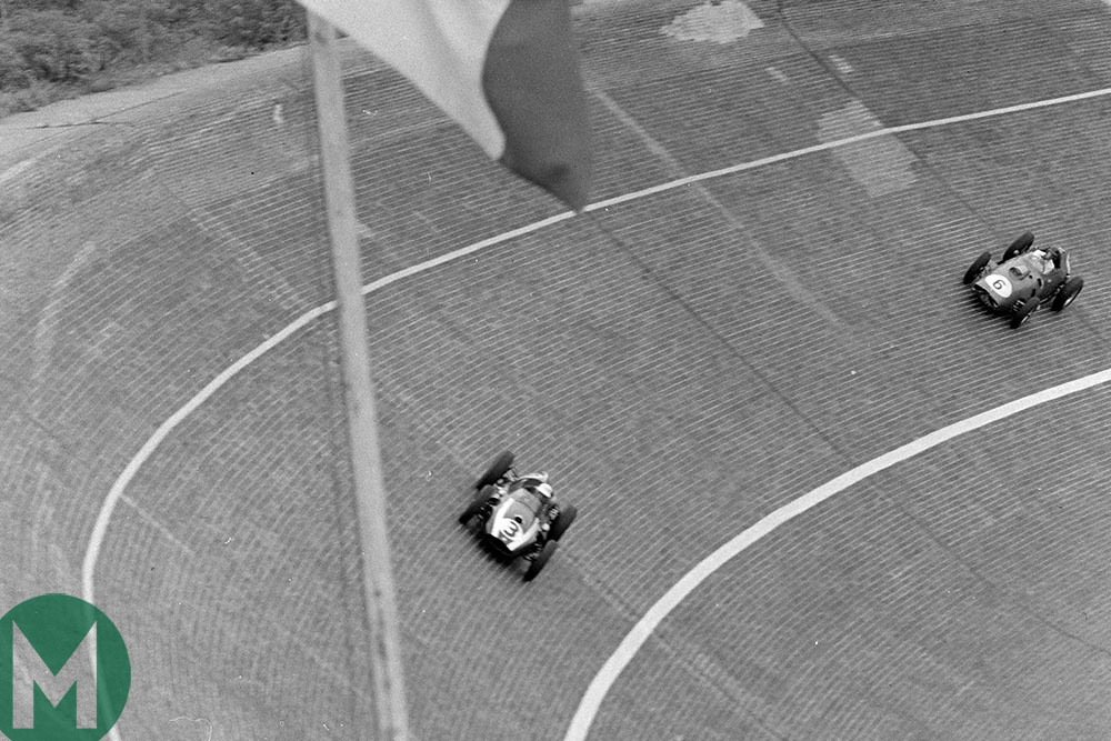 Masten Gregory's Cooper mixed it with the Ferraris early on