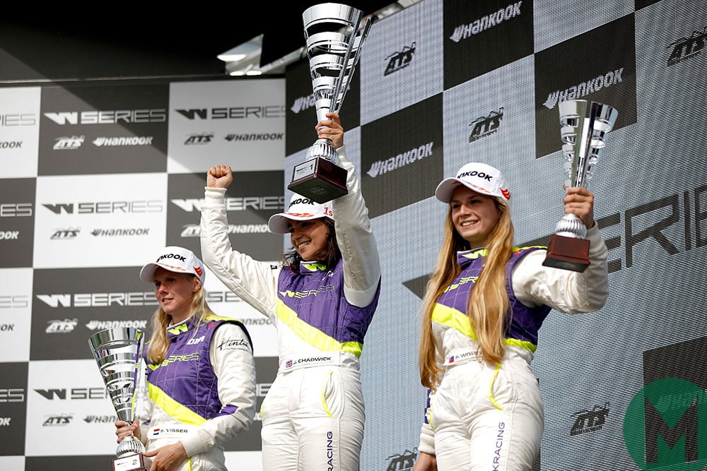 Jamie Chadwick, Beitske Visser and Fabienne Wohlwend celebrate on the Misano podium