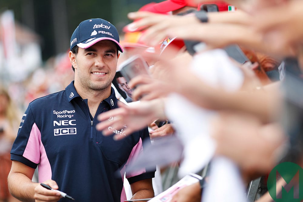 Sergio Perez signing autographs