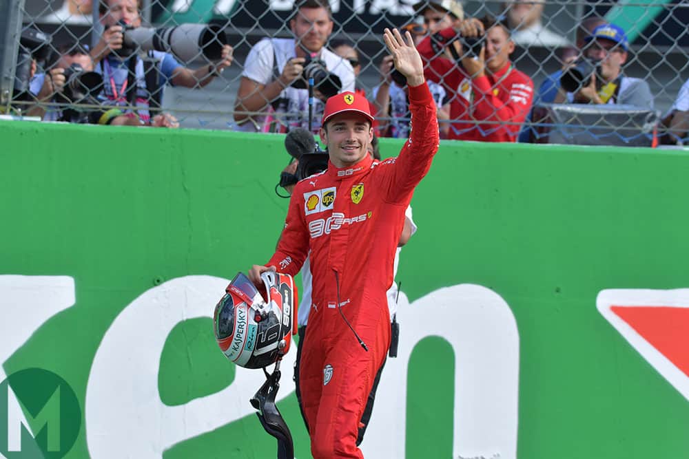 Charles Leclerc waves to the crowd after gaining pole position for the 2019 Formula 1 Italian Grand Prix