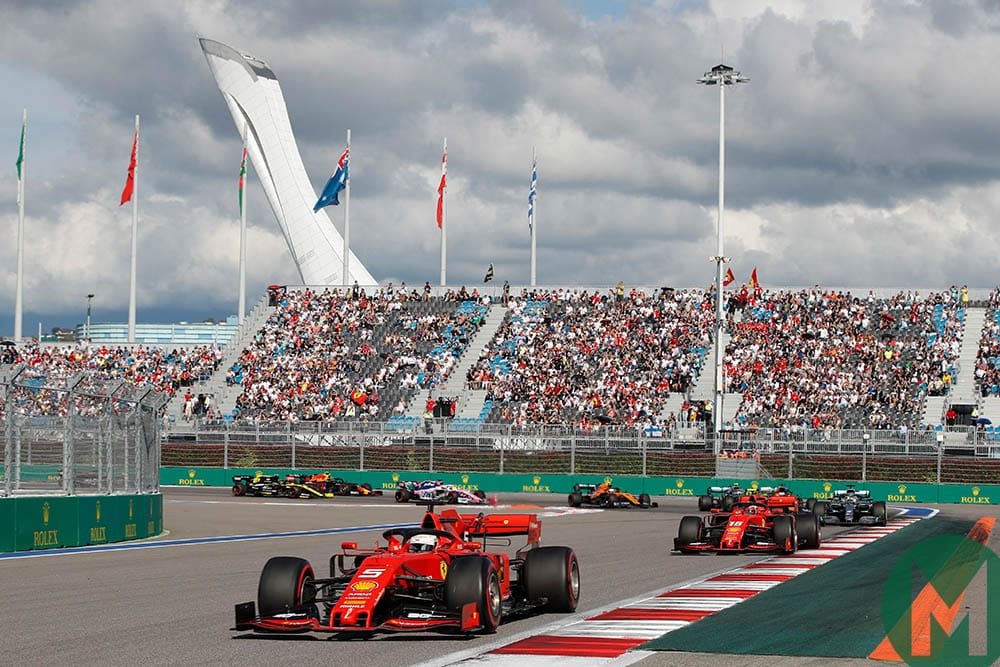 Sebastian Vettel pulls away from Charles Leclerc while leading in the early stages of the 2019 F1 Russian Grand Prix