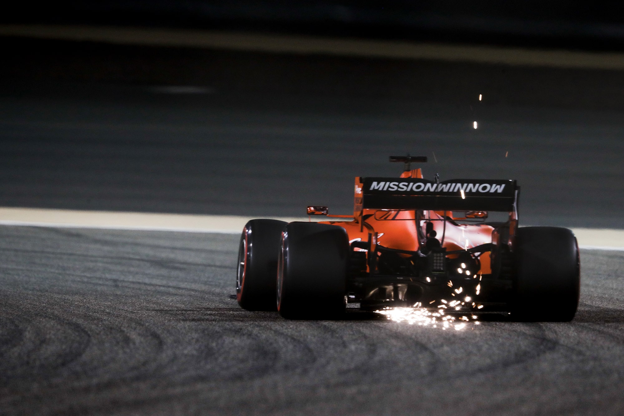 2019 Ferrari rear shot with sparks