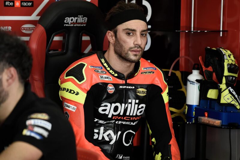 Andrea Iannone sitting in the pits in February 2019