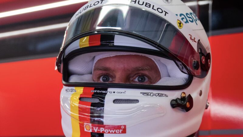 Sebastian Vettel looks out from his helmet