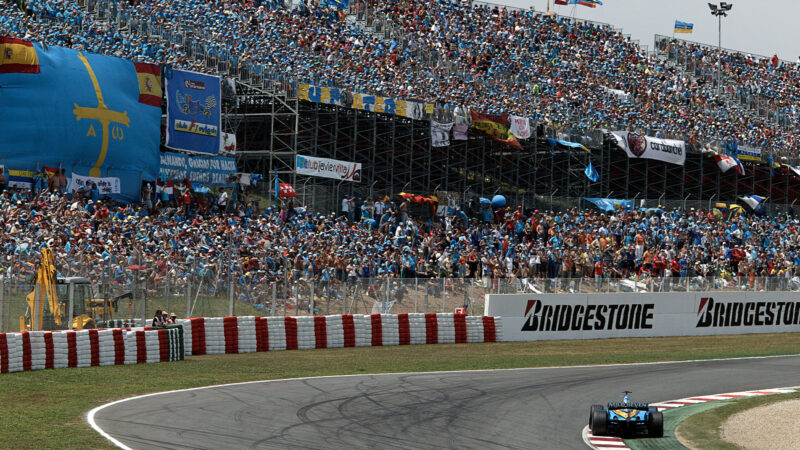 Fernando Alonso on his way to victory in front of a vast crowd at the Circuit de Catalunya during the 2006 Spanish Grand Prix