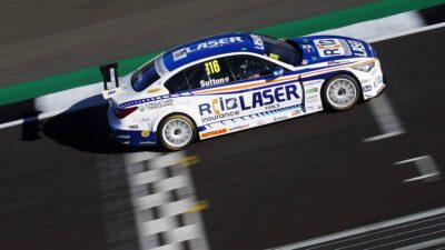 Ash Sutton crosses the finish line at Silverstone in his Infiniti Q50 in the 2020 BTCC championship