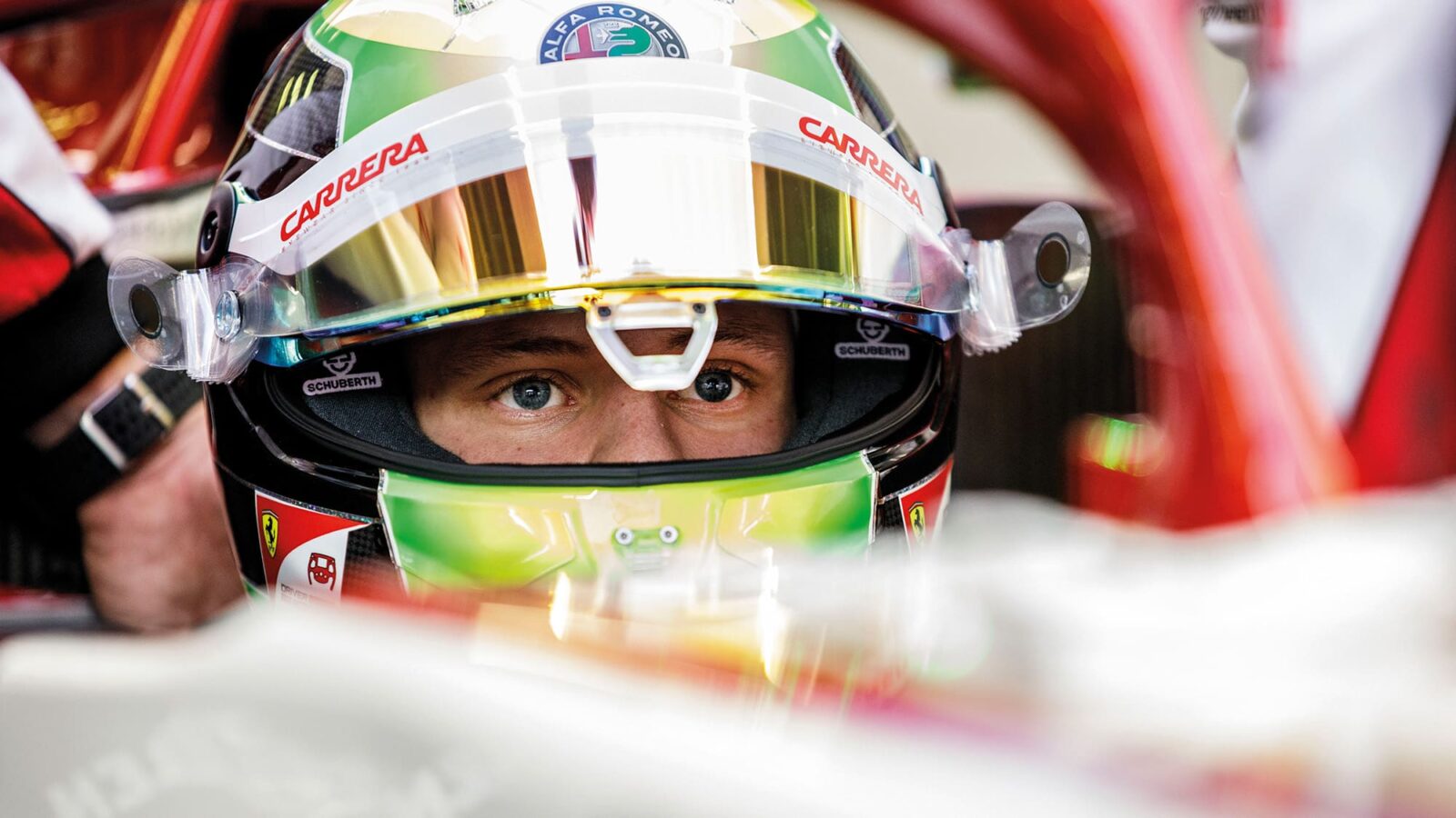 Mick Schumacher in the cockpit of a 2020 Alfa romeo F1 car