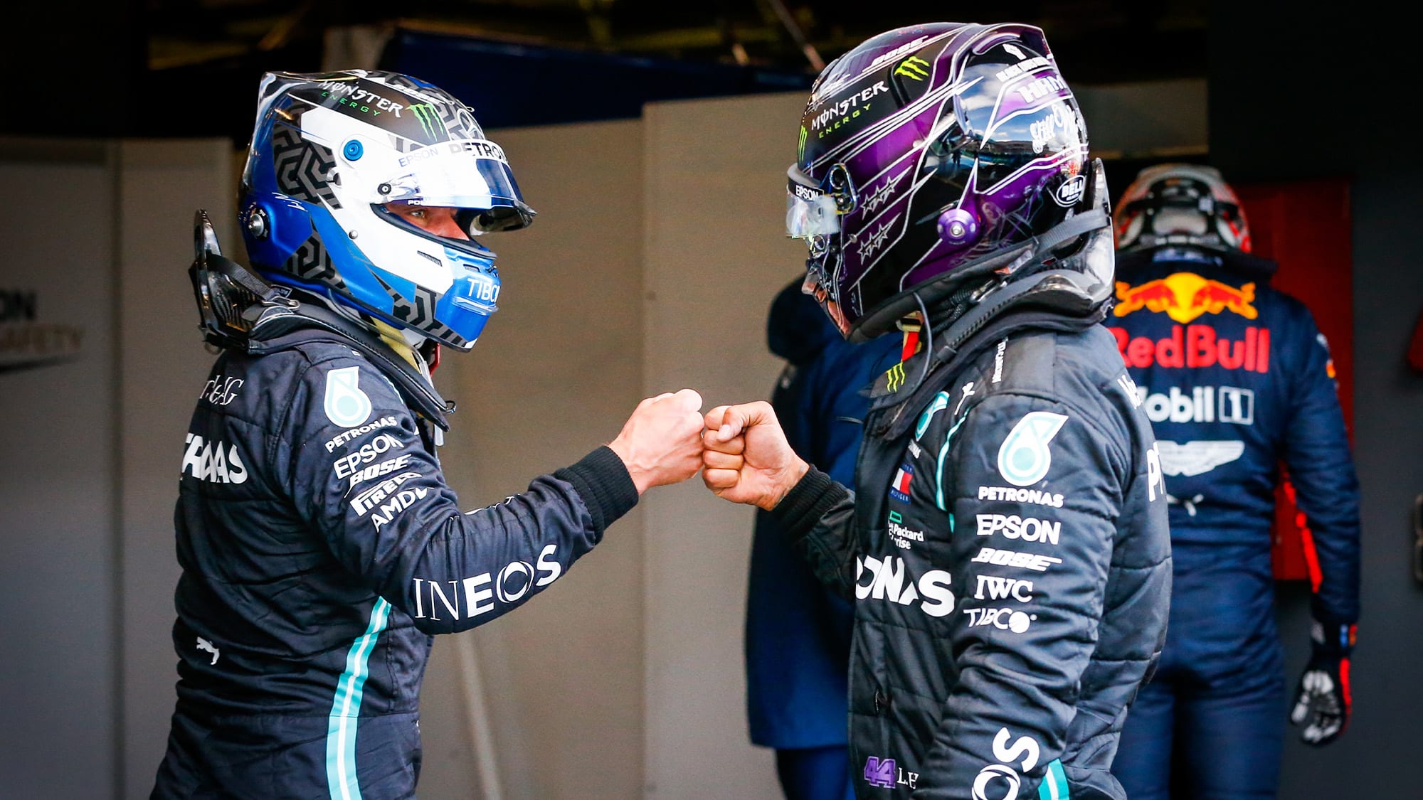 Valtteri Bottas and Lewis Hamilton bump fists after qualifying 1-2 at the Nurburgring for the 2020 F1 Eifel Grand Prix