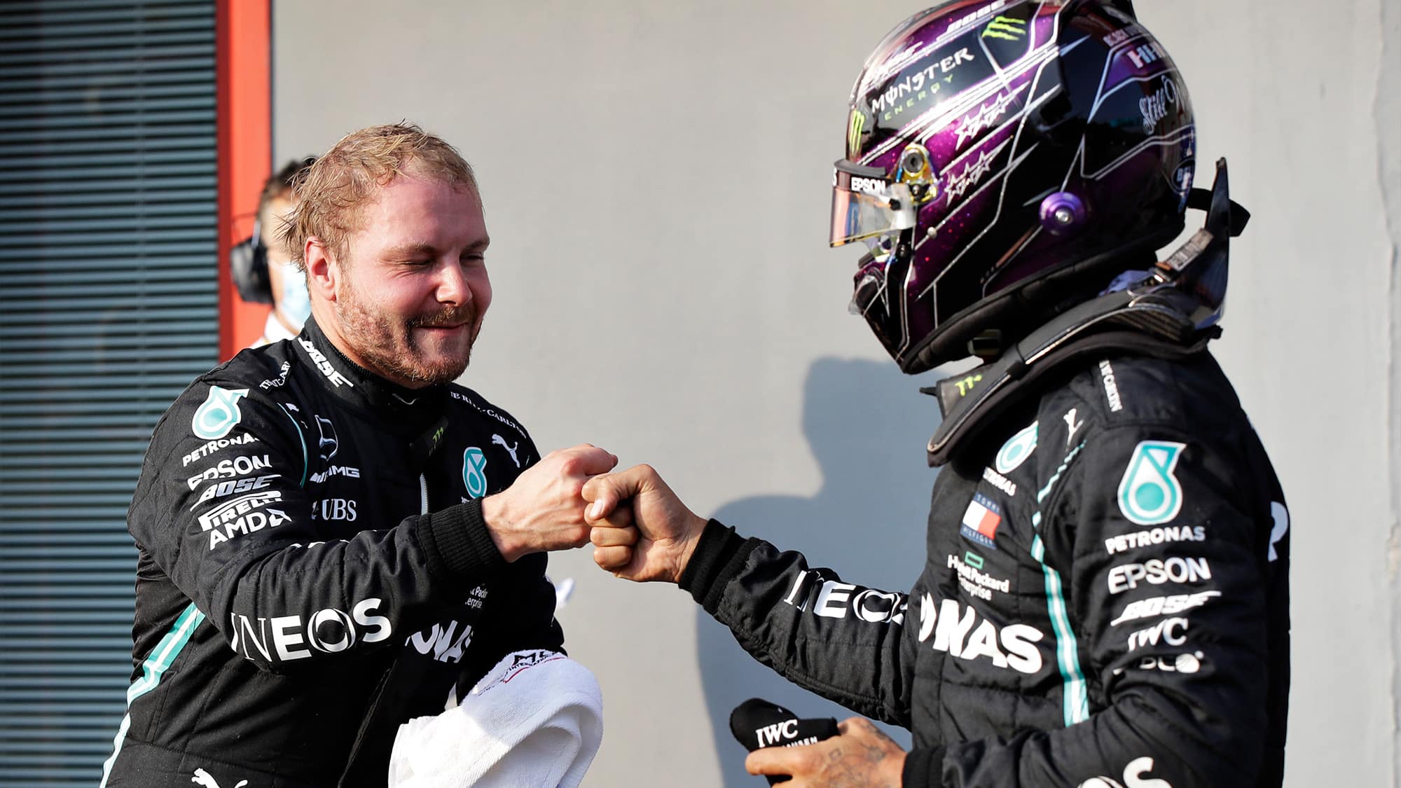 Valtteri Bottas and Lewis Hamilton bump fists at imola after qualifying for the 2020 F1 Emilia Romagna Grand Prix