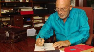 Signed by Sir Stirling Moss