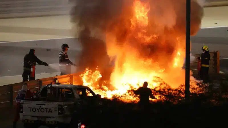 Blazing wreckage of Romain Grosjean's car at the Bahrain circuit in 2020