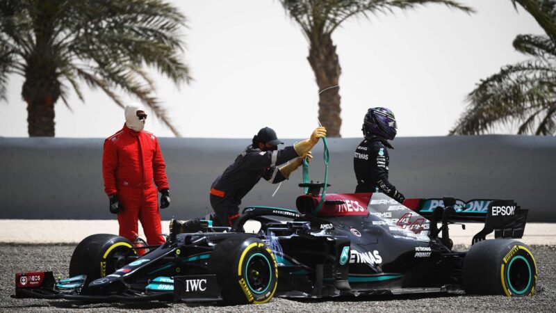 BAHRAIN, BAHRAIN - MARCH 13: Lewis Hamilton of Great Britain and Mercedes GP looks dejected after stopping on track during Day Two of F1 Testing at Bahrain International Circuit on March 13, 2021 in Bahrain, Bahrain. (Photo by Clive Mason/Getty Images)
