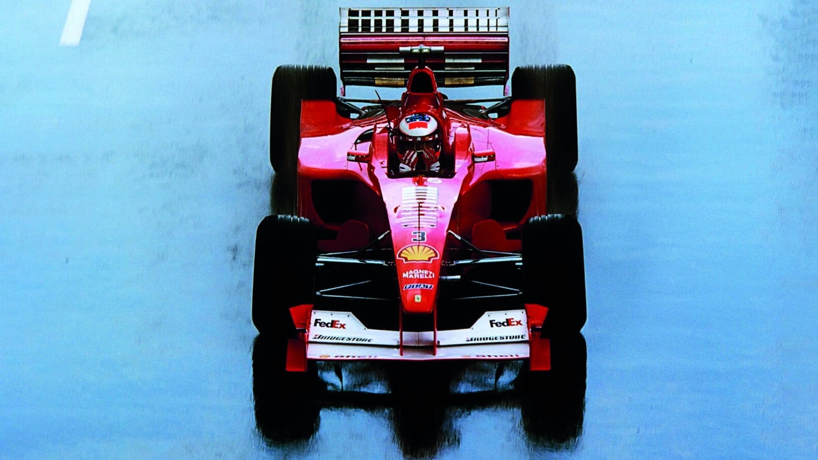 Ferrari-F2000-driving-in-rain