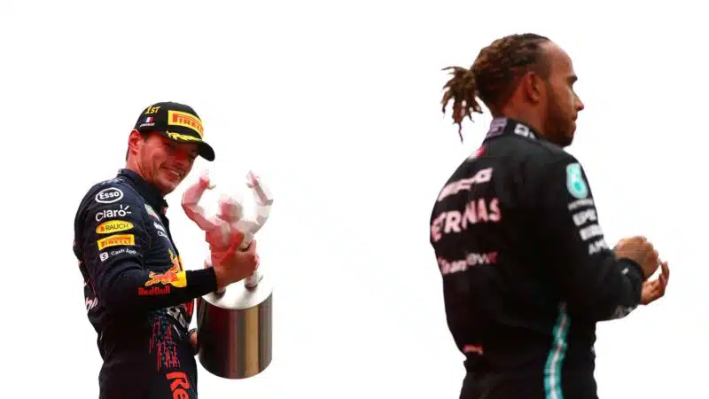 Max Verstappen examines his winning trophy at the 2021 French Grand Prix