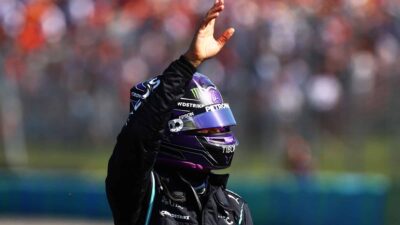 BUDAPEST, HUNGARY - JULY 31: Pole position qualifier Lewis Hamilton of Great Britain and Mercedes GP celebrates in parc ferme during qualifying ahead of the F1 Grand Prix of Hungary at Hungaroring on July 31, 2021 in Budapest, Hungary. (Photo by Dan Istitene - Formula 1/Formula 1 via Getty Images)
