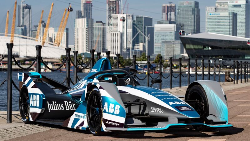 Formula E car in front of the London skyline