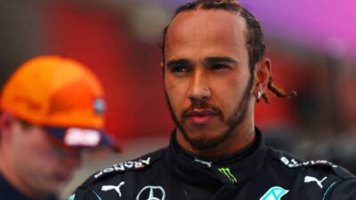 Lewis Hamilton with Max Verstappen in background