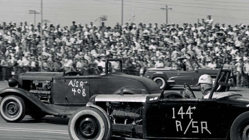 UNITED STATES - SEPTEMBER 03: 1958 NHRA National Drag Races - Oklahoma City. The more modern powered Street Roadster in the far lane pulls a hole shot on the flathead-equipped car in the near lane. (Photo by Bob D'Olivo/The Enthusiast Network via Getty Images/Getty Images)