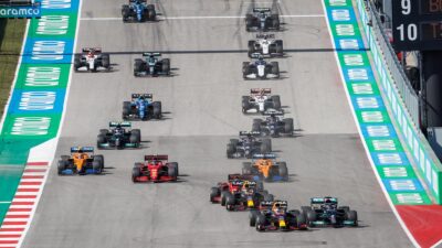 Lewis Hamilton and Max Verstappen fight for the lead at the start of 2021 US Grand Prix