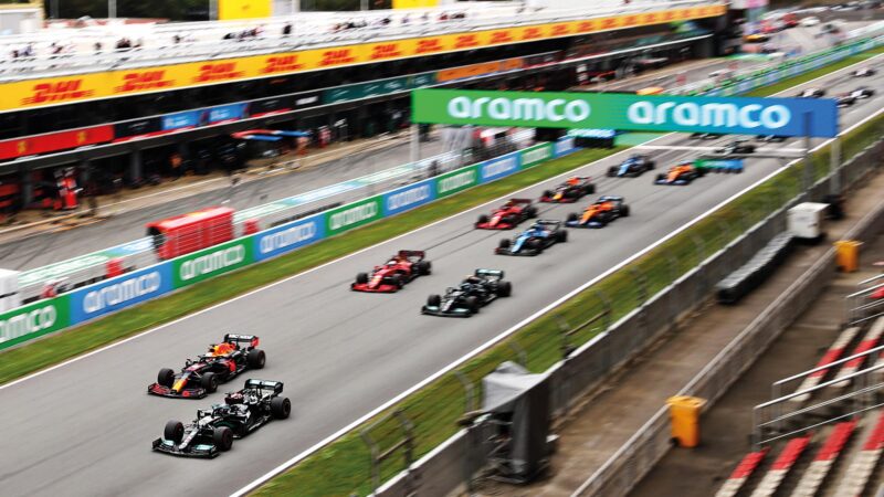 Lewis Hamilton leads from Max Verstappen at the start of the 2021 Spanish Grand Prix