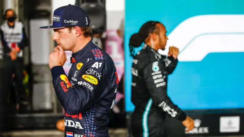 Max Verstappen and Lewis Hamilton walk away from each other