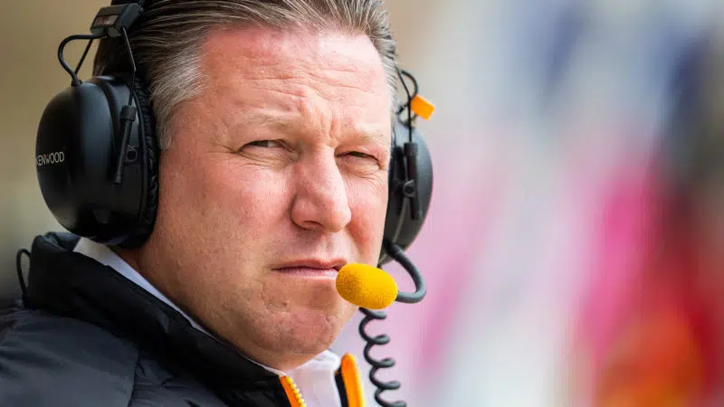 Zak Brown wearing headset
