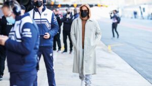 Lewis Hamilton in sunglasses and face mask in Barcelona pitlane