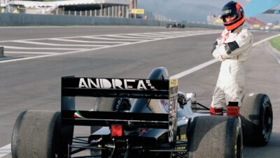 Perry McCarthy, driver for the #35 Andrea Moda Formula Moda S921 Judd 3.5 V10 stands by his car arms folded in frustration after a mechaical failure occurred at the end of pit lane during pre qualifying for the Tio Pepe Spanish Grand Prix on 1st May 1992 on the Circuit de Catalunya in Barcelona, Spain. (Photo by Mike Hewitt/Getty Images)