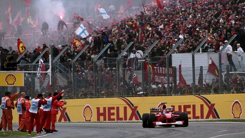 Michael Schumacher celebrates winning the 2000 San Marino GP