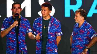 MIAMI GARDENS, FLORIDA - MAY 04: Nicholas Latifi of Canada and Williams, Alexander Albon of Thailand and Williams and Jost Capito, CEO of Williams F1 talk to the crowd during the F1 Grand Prix of Miami Opening Party at Hard Rock Stadium on May 04, 2022 in Miami Gardens, Florida. (Photo by Dan Istitene - Formula 1/Formula 1 via Getty Images)