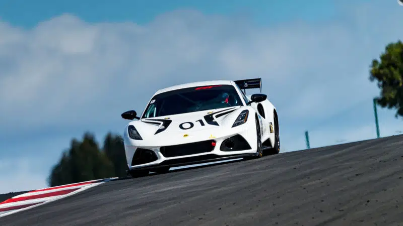 Lotus Emira GT4 on the crest of a hill