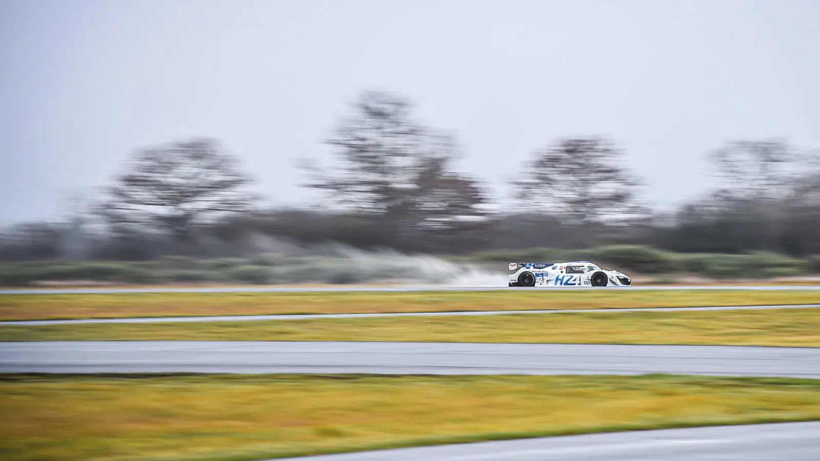 Spray kicked up by Mission H24 hydroegn racing car