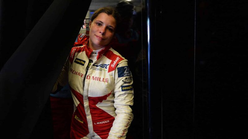French's driver Lilou Wadoux of Oreca Gibson WEC, reacts in the pits during the 90th edition of the Le Mans 24 Hours endurance race, in Le Mans, north-western France, on June 12, 2022. (Photo by JEAN-FRANCOIS MONIER / AFP) (Photo by JEAN-FRANCOIS MONIER/AFP via Getty Images)