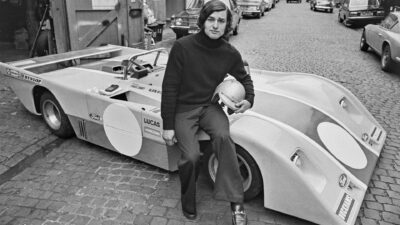 Racing driver Alain De Cadenet with the Duckhams LM1 racing car built for him and his team-mate Chris Craft, UK, 20th June 1973. (Photo by Evening Standard/Hulton Archive/Getty Images)