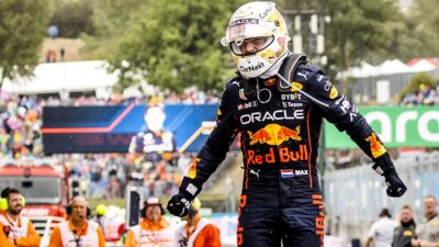 Max Verstappen clenches his fists to celebrate victory in the 2022 Hungarian Grand Prix