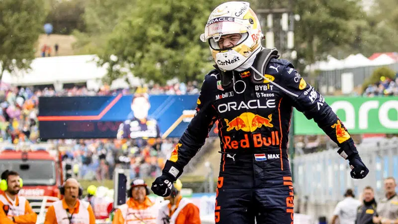 Max Verstappen clenches his fists to celebrate victory in the 2022 Hungarian Grand Prix