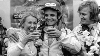 Peter Revson on the SIlverstone podium with Ronnie Peterson at the 1973 British Grand Prix