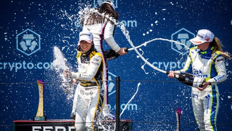 Jamie-Chadwick-celebrates-W-Series-win-on-the-Miami-podium-in-2022