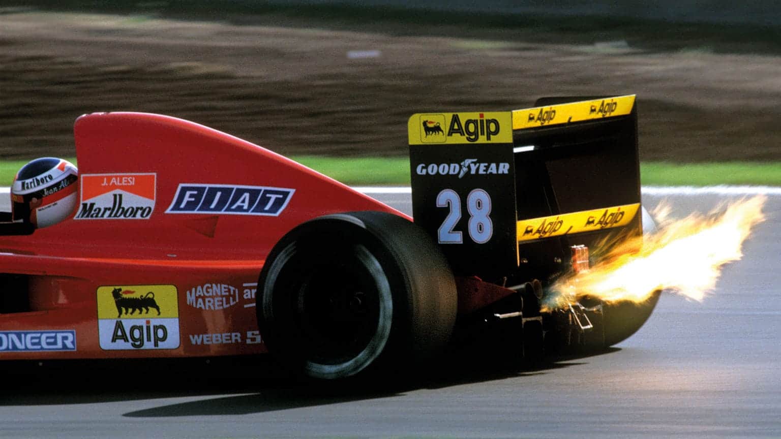Ferrari’s Jean Alesi lights up the Circuit de Catalunya